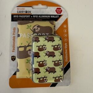 NWT Miami Carry On RFID wallet and passport holder “happy sloths”